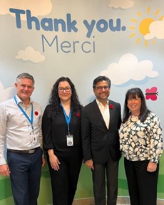 PS Yasir Naqvi with staff from Roger Neilson Children's Hospice